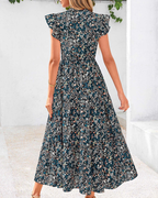 Boho women's midi dress “Juliet” – Floral with a V-neckline, tiered ruffles, and side pockets
