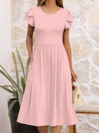 Robe midi florale Elisa pour femme – manches courtes, col rond, coupe trapèze avec poches