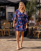 Maya-minikjole til kvinder – boho-blomsterprint, V-udskæring og korte ærmer