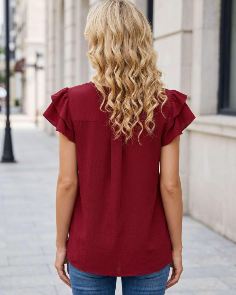 Grace Blouse Femme – Élégante blouse avec col en V, volant à l'avant et manches courtes
